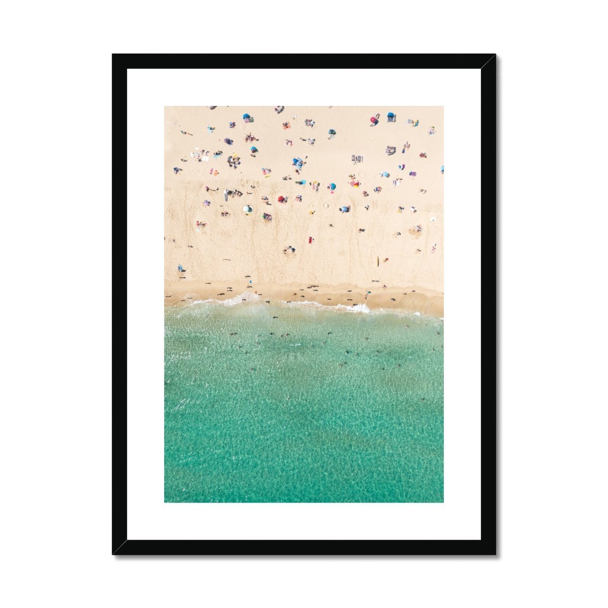 beachgoers at porthcurno framed print